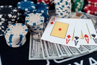 Live AduQ dealer at situs23 studio with cards and chip stack